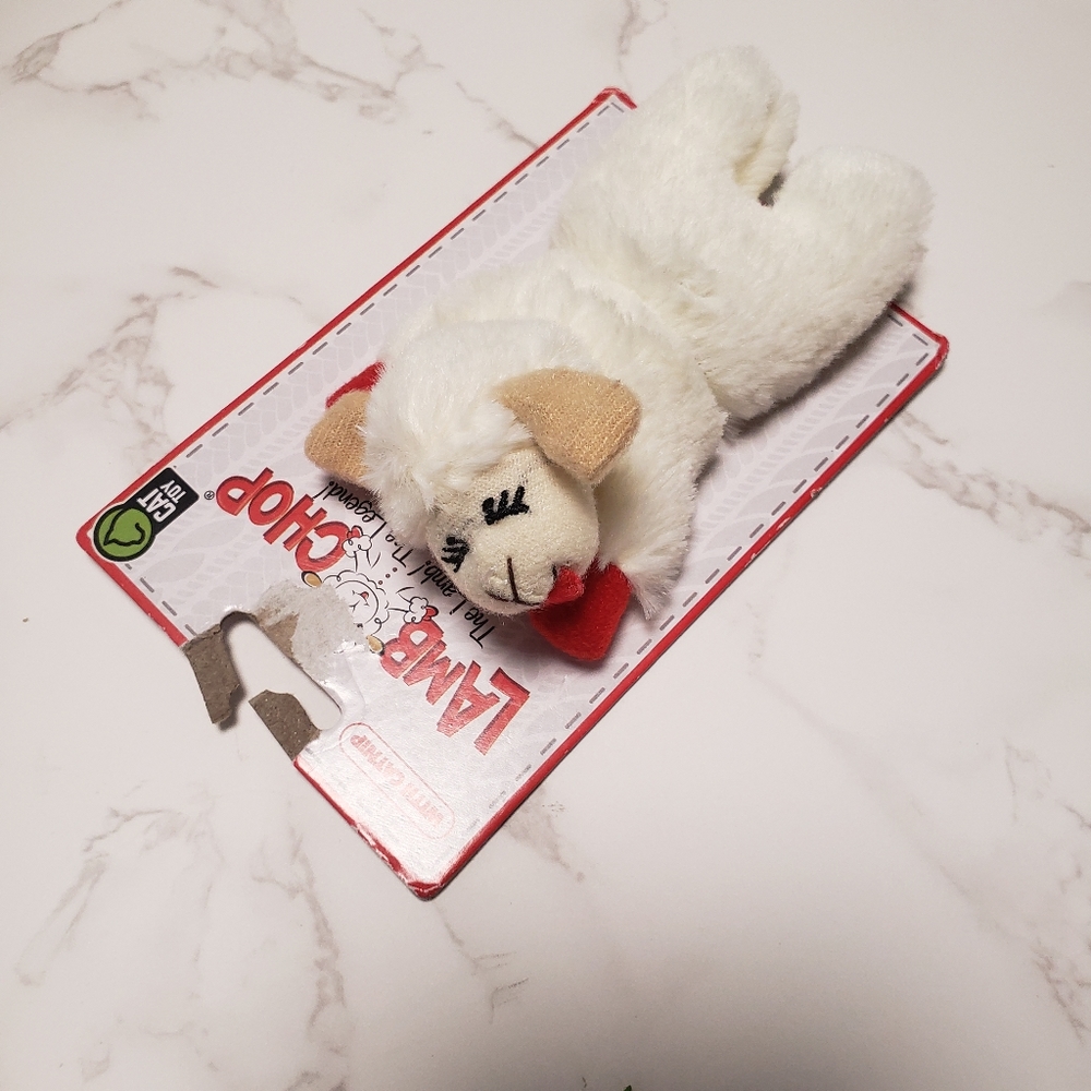 Lamb chop plush cat toy.